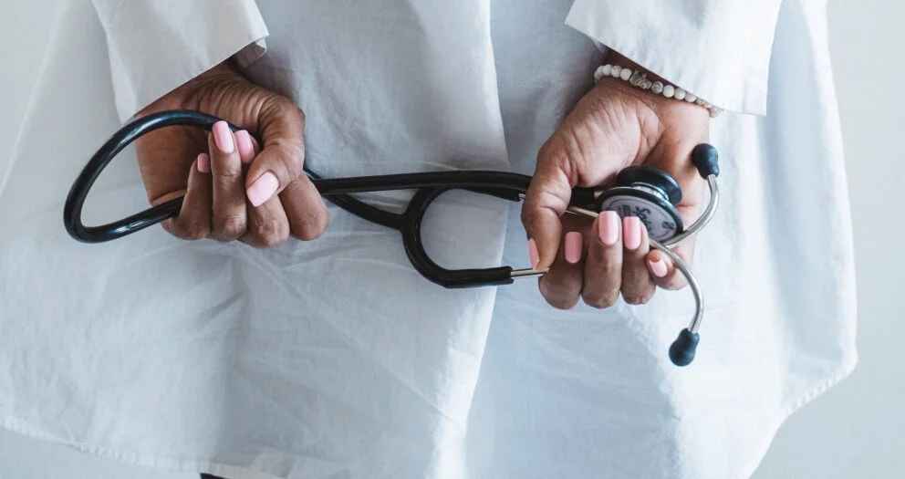 Health practitioner holding a key nursing equipment